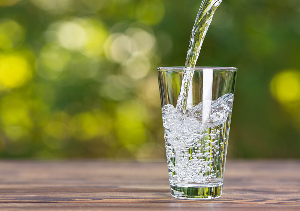 water pouring into glass water pouring into glass