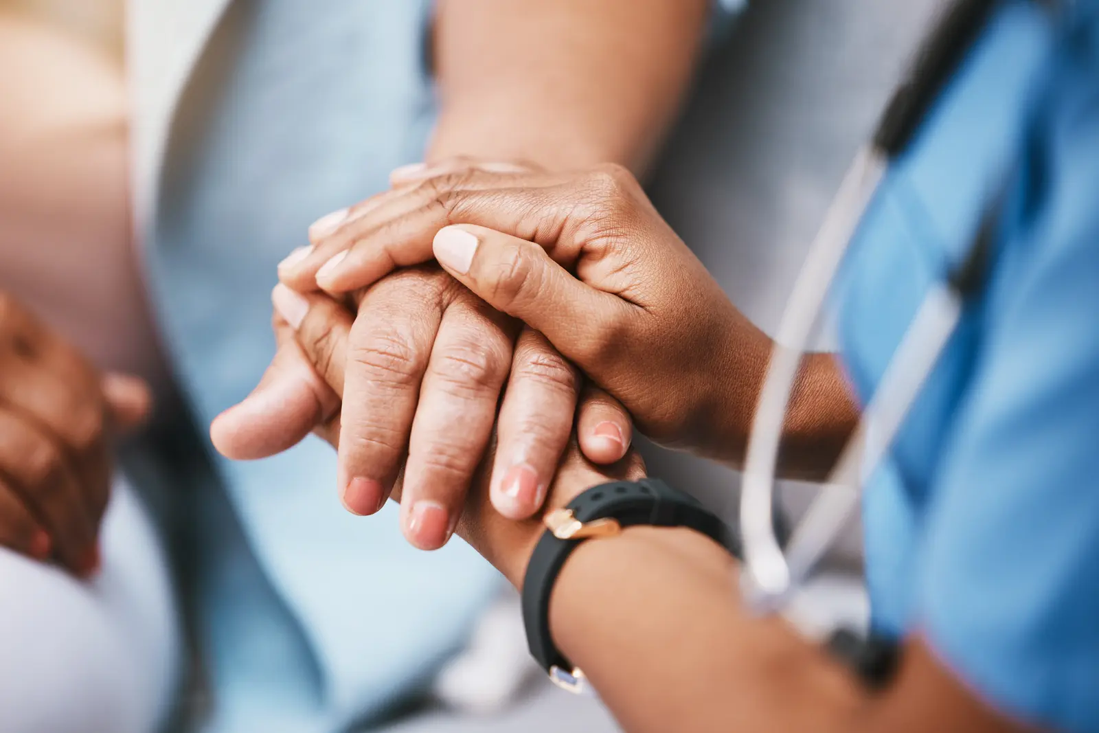 holding hands with patient for help holding hands with patient for help